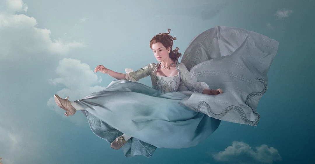 Woman in an eighteenth-century-style dress floating in the sky against a backdrop of clouds, creating a surreal, dreamlike image.