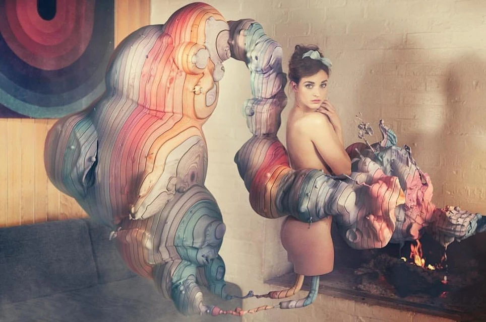 Artistic shot featuring a female model with bare shoulders posing near unique art installation with warm lighting and pastel color palette.