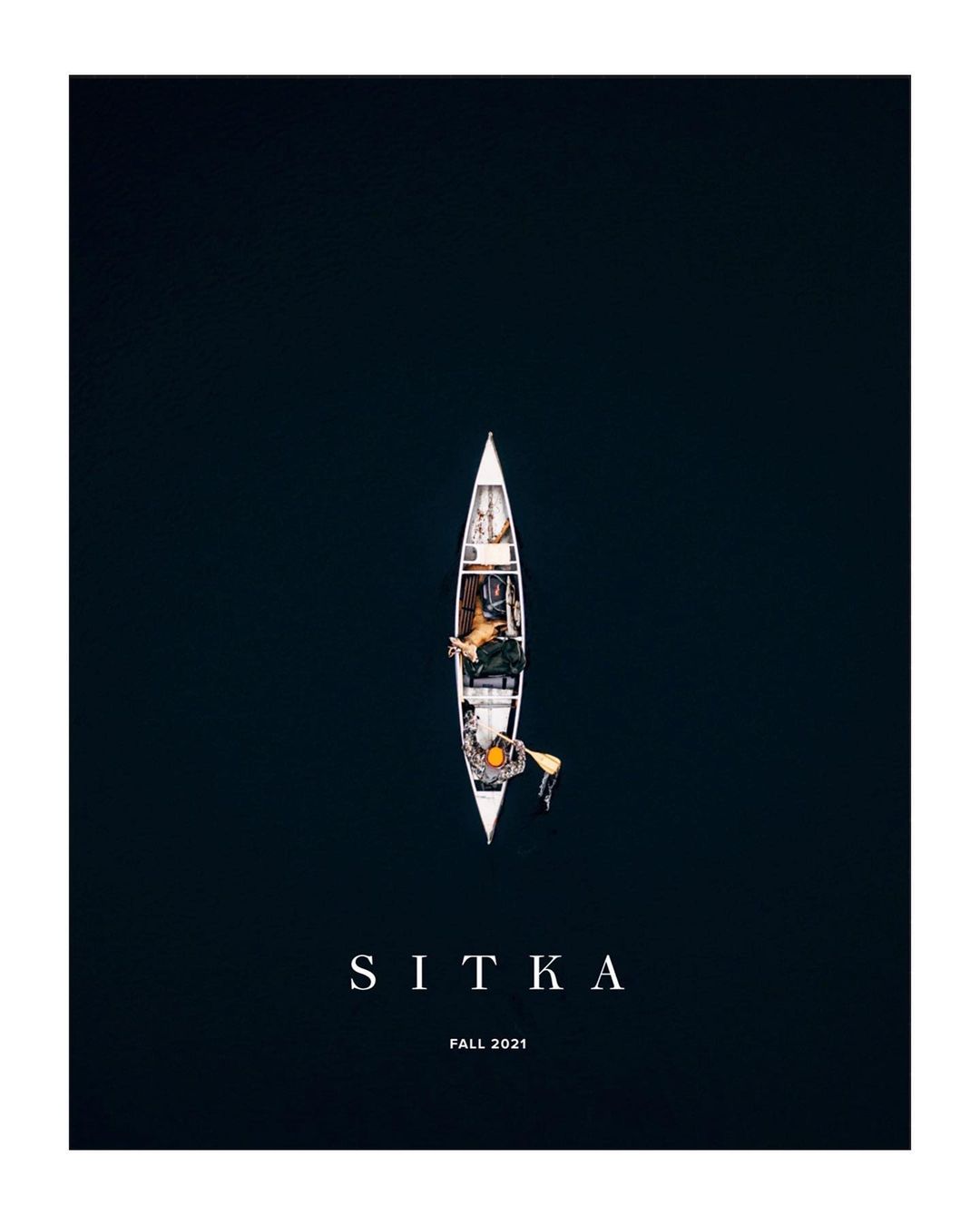 Aerial view of two people in a canoe on dark water, creating a serene scene. The canoe is centrally placed, with clear text overlay.