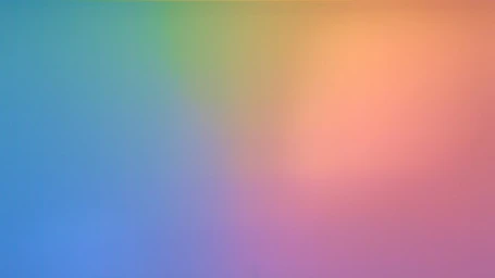 Soft gradient abstract background with blended pastel hues of blue, green, peach, and pink tones.