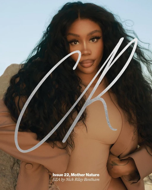 Portrait of SZA, singer and songwriter, in a magazine cover shot with a natural outdoor setting. The image emphasizes SZA's appearance and style.