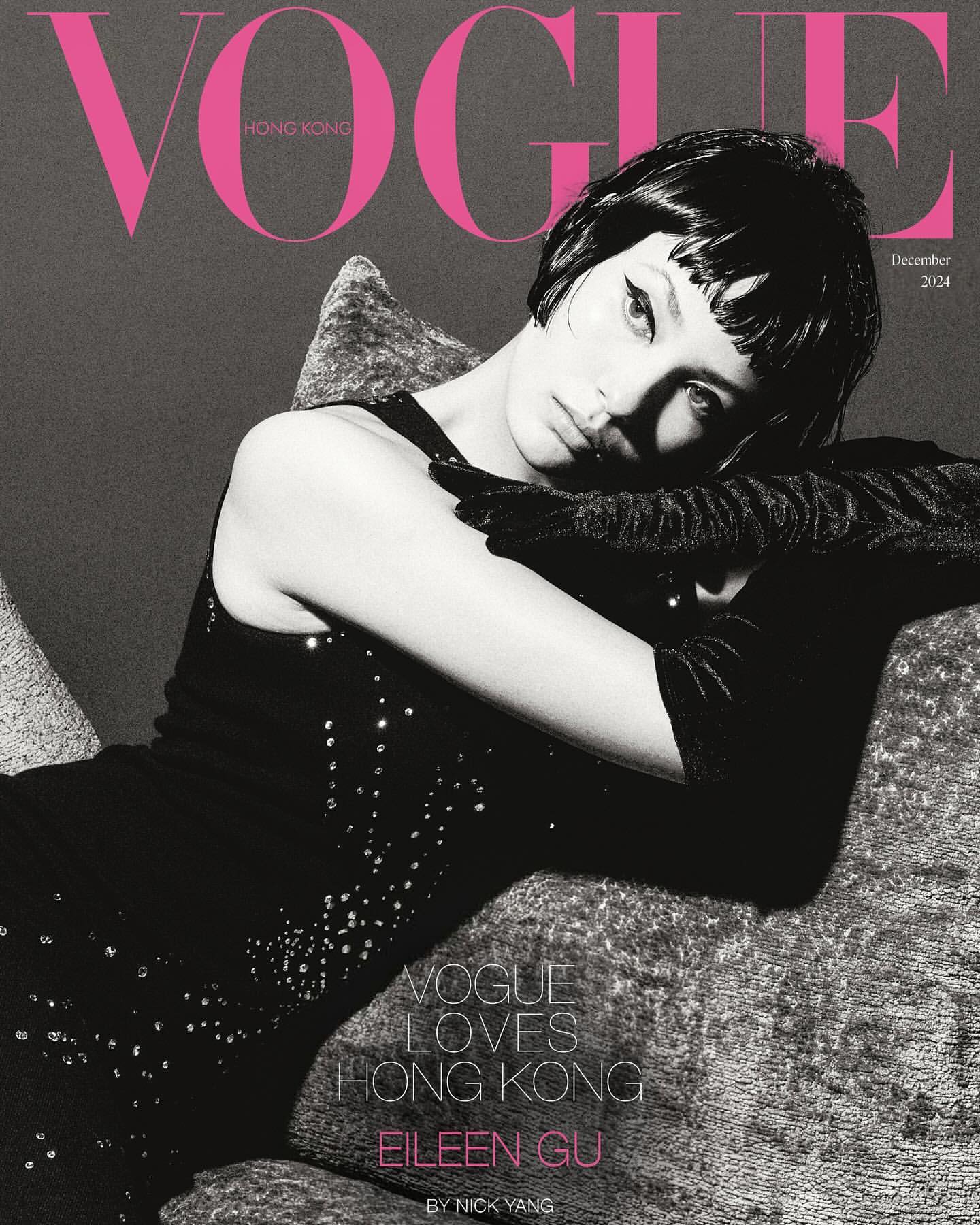 Vogue Hong Kong cover featuring a young woman with dark hair wearing black gloves and a dress, resting on a patterned sofa against a gray backdrop.