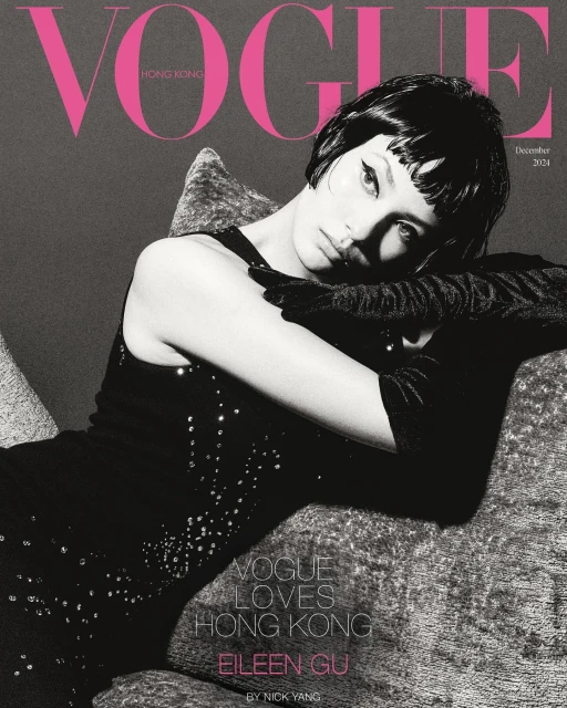 Vogue Hong Kong cover featuring a young woman with dark hair wearing black gloves and a dress, resting on a patterned sofa against a gray backdrop.