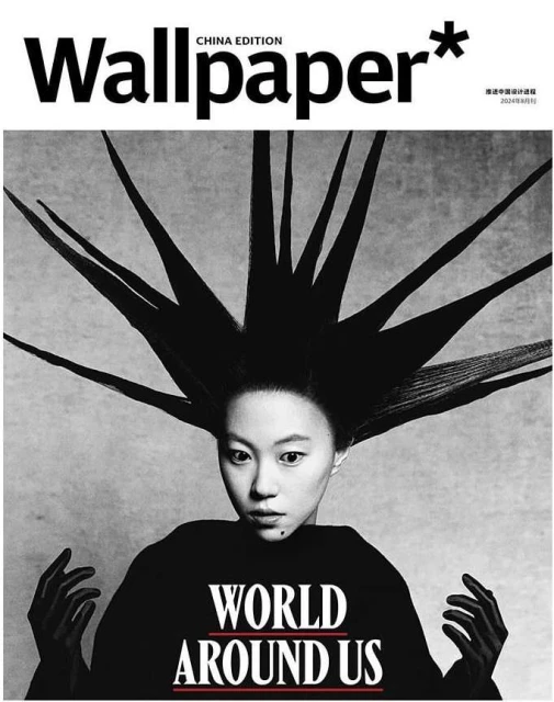 Wallpaper China Edition magazine cover featuring an Asian woman with spiky hair, wearing a black top with white text, against a gray background.