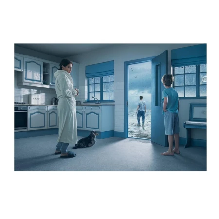 Woman and child observe a man walking on the beach through a doorway in a surreal, dreamy scene inside a blue-toned kitchen.
