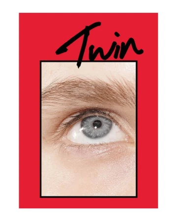 Close-up shot showcases the eye and eyebrow of an adult female, framed within a bold red border, highlighting beauty and editorial style.
