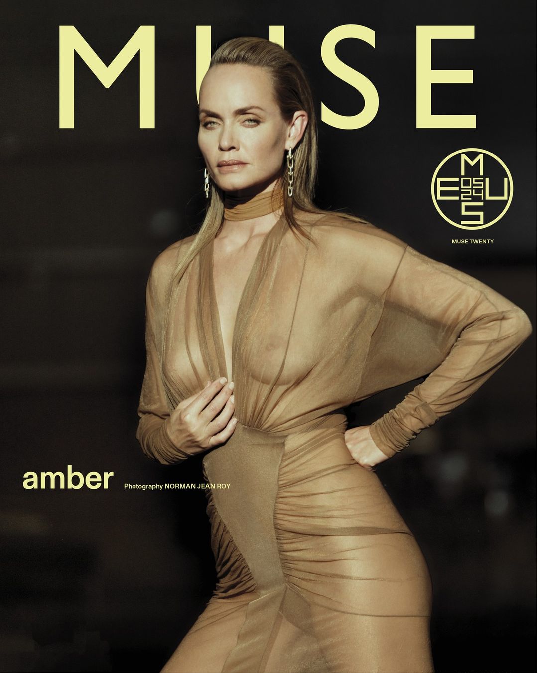 Amber Valletta poses in a tan dress for a fashion magazine cover, featuring "Muse" in yellow text against a dark background.