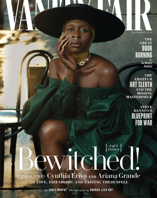 Magazine cover featuring Cynthia Erivo wearing a large hat and green dress while seated on a chair, with magazine text overlayed.