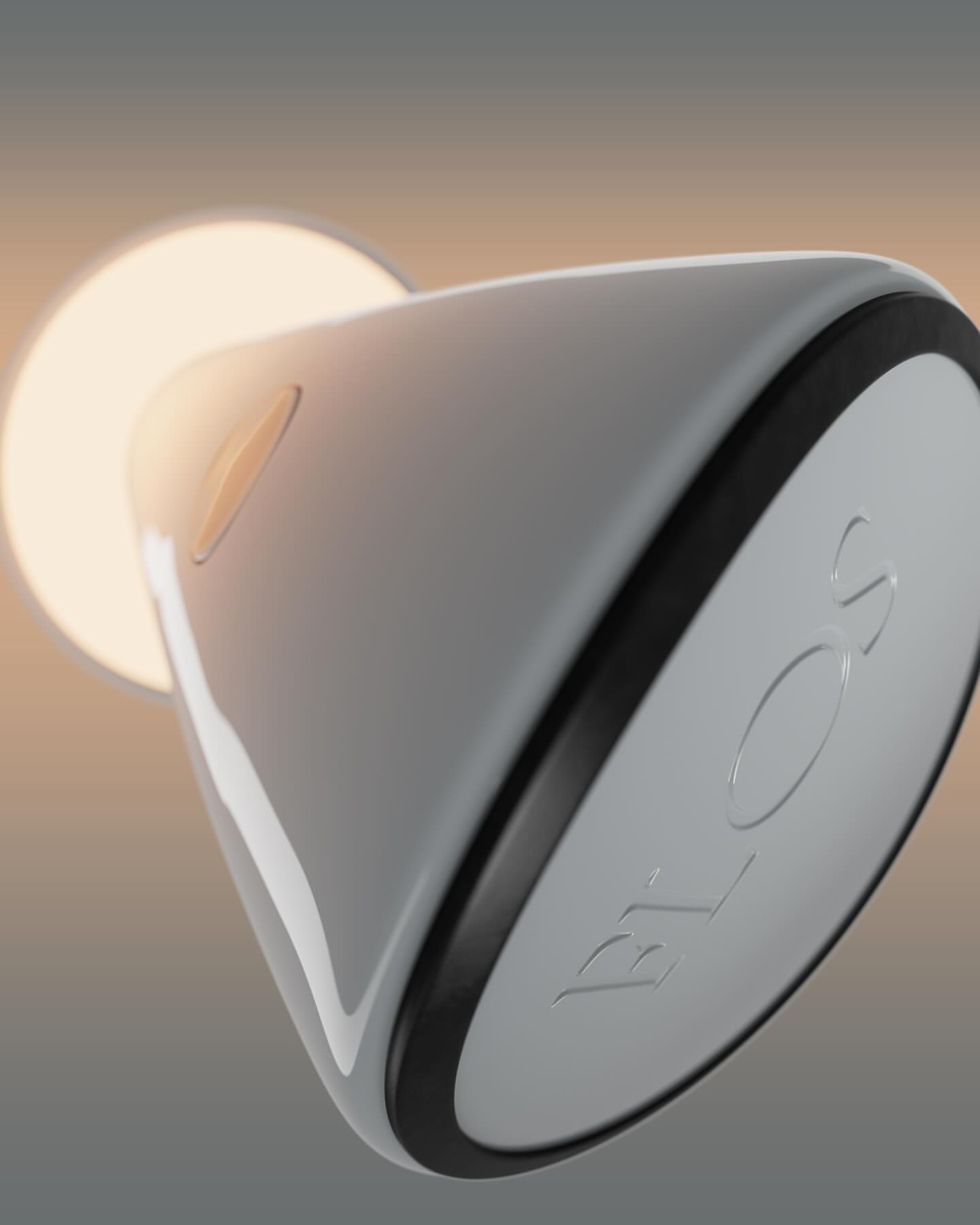 Close-up of a Flos-brand bedside lamp with a gray, conical shade and circular base, emitting a soft, warm light in a gradient setting.