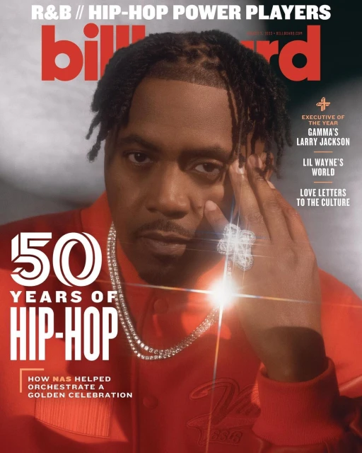 Billboard magazine cover featuring a portrait of a Black male musician wearing a red jacket and jewelry, commemorating 50 years of hip-hop.