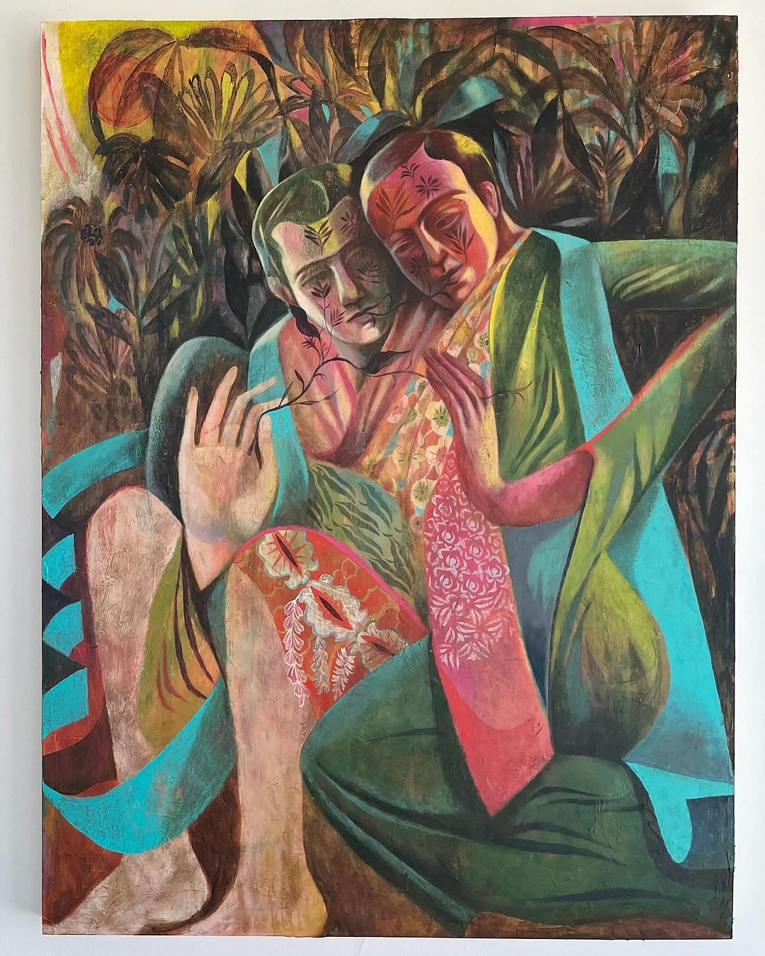 Painting of two figures in an embrace surrounded by floral and plant designs in a vibrant color palette of greens, yellows, and pinks.