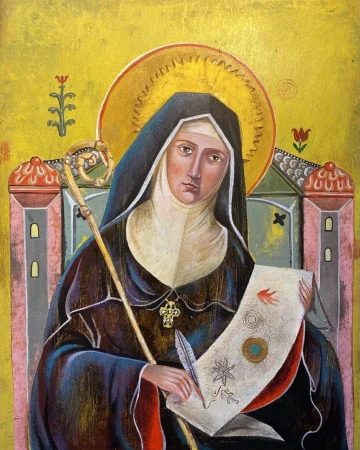 Illustration of a saintly woman in robes holding a quill and scroll with religious symbols, set against a golden yellow background.
