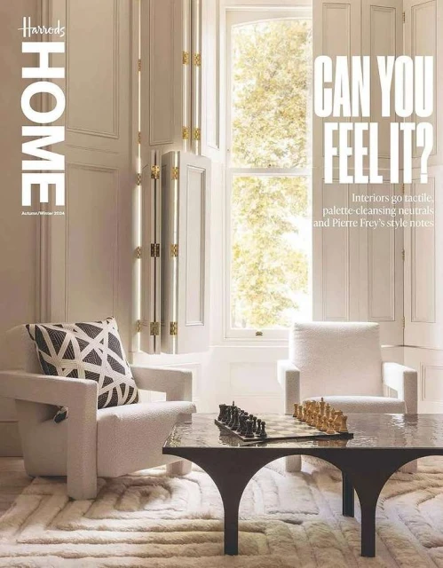 Harrods Home Autumn/Winter magazine cover featuring a modern living room with armchairs, chess set, and natural light from a window.