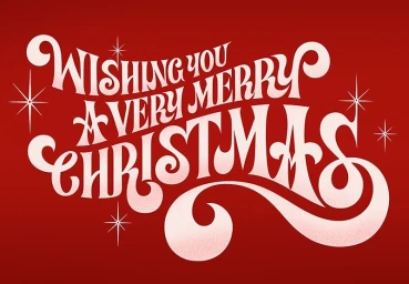 Cream-coloured ornate typography reading Wishing You A Very Merry Christmas against a deep red textured background