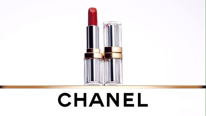 Two tubes of red lipstick on a gold bar, displayed on a white background with the name CHANEL in bold black letters.