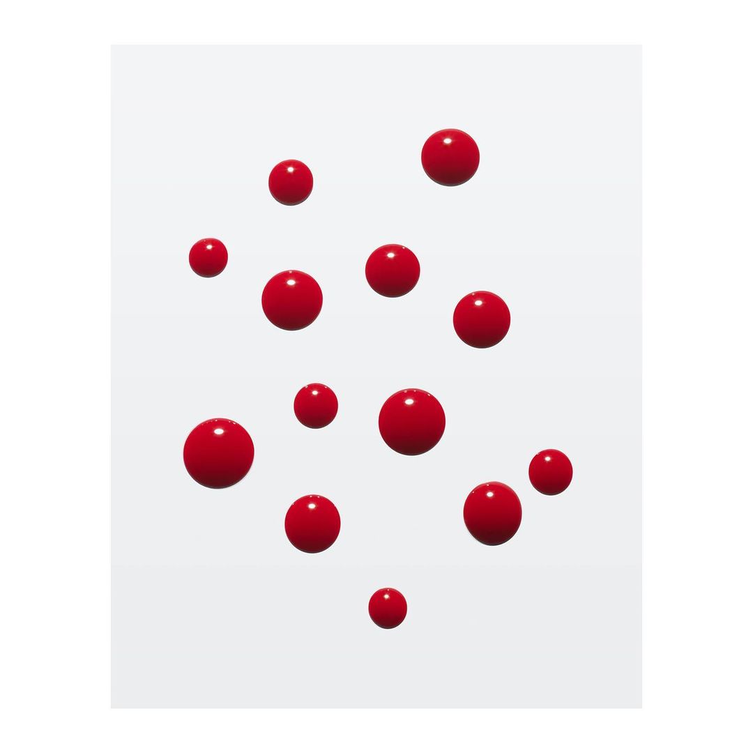 Floating array of red glossy spheres, creating a visually dynamic composition against a soft, diffused white background.
