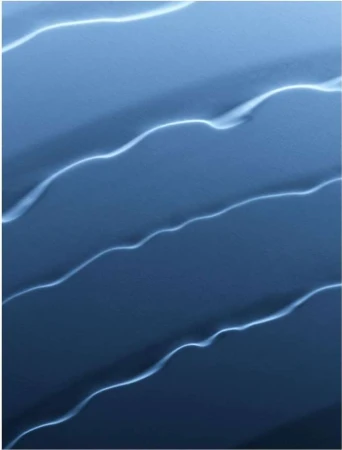 Abstract image featuring wavy, parallel lines in a cool blue palette, reminiscent of flowing water or liquid motion on a monochrome background.