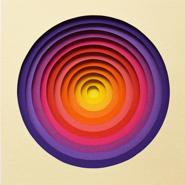 Abstract art of concentric circles made of paper layers with yellow, orange, red, pink, and purple in a square ivory frame.