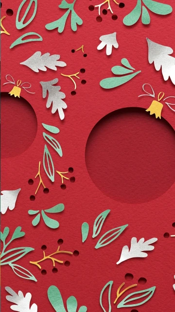 A festive paper art design featuring cutout leaves, berries, and ornaments on a red textured background with circular openings.
