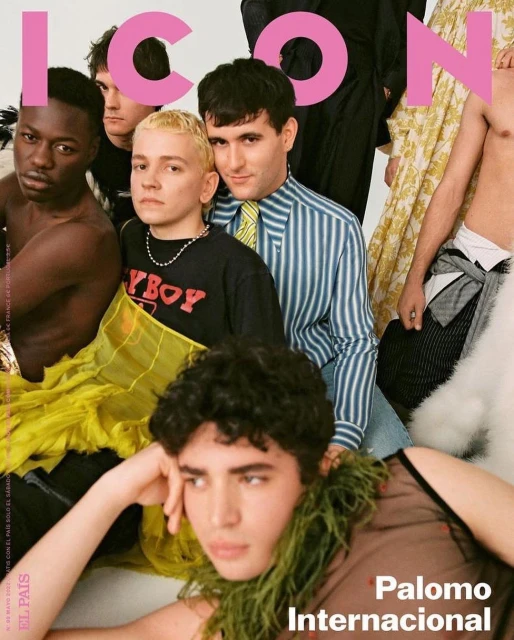 Magazine cover featuring a group of people with diverse styles and fashion, including one wearing a feather boa and another a striped blazer.