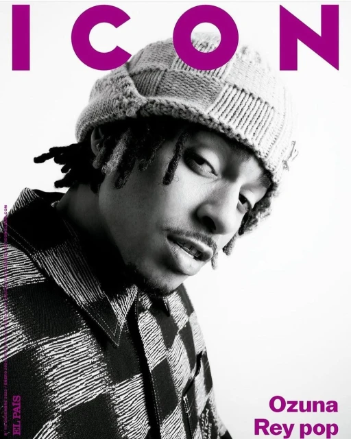 Black and white portrait of Ozuna on the cover of ICON magazine, wearing a patterned beanie and a collared shirt with a bold checkered pattern.