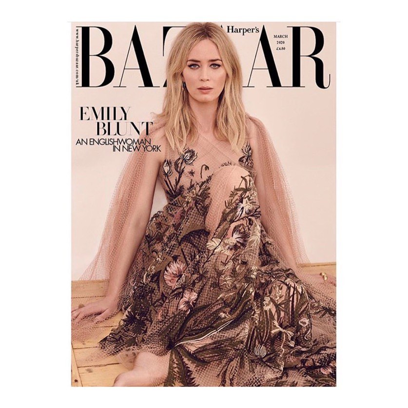 Emily Blunt on Harper's Bazaar cover, March 2020. She wears a floral dress and poses in a photo studio with light skin and blonde hair.