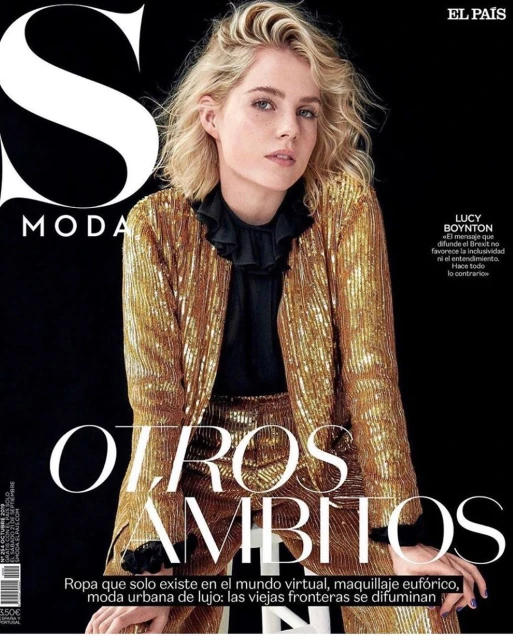 Lucy Boynton graces the cover of El País S Moda in a gold sequined suit with a ruffled black top, set against a dark backdrop.