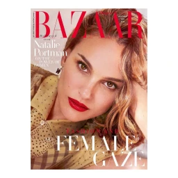 Close-up portrait of Natalie Portman with red lipstick and spotted blouse, photographed by Pamela Hanson for Harper's Bazaar.