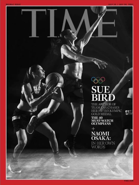 Time Magazine cover featuring WNBA player Sue Bird in dynamic basketball action, set against a stark black background with red border.