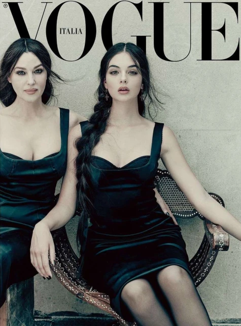 Vogue Italia cover featuring Monica Bellucci and Deva Cassel, a mother and daughter duo, posing in matching elegant black dresses.