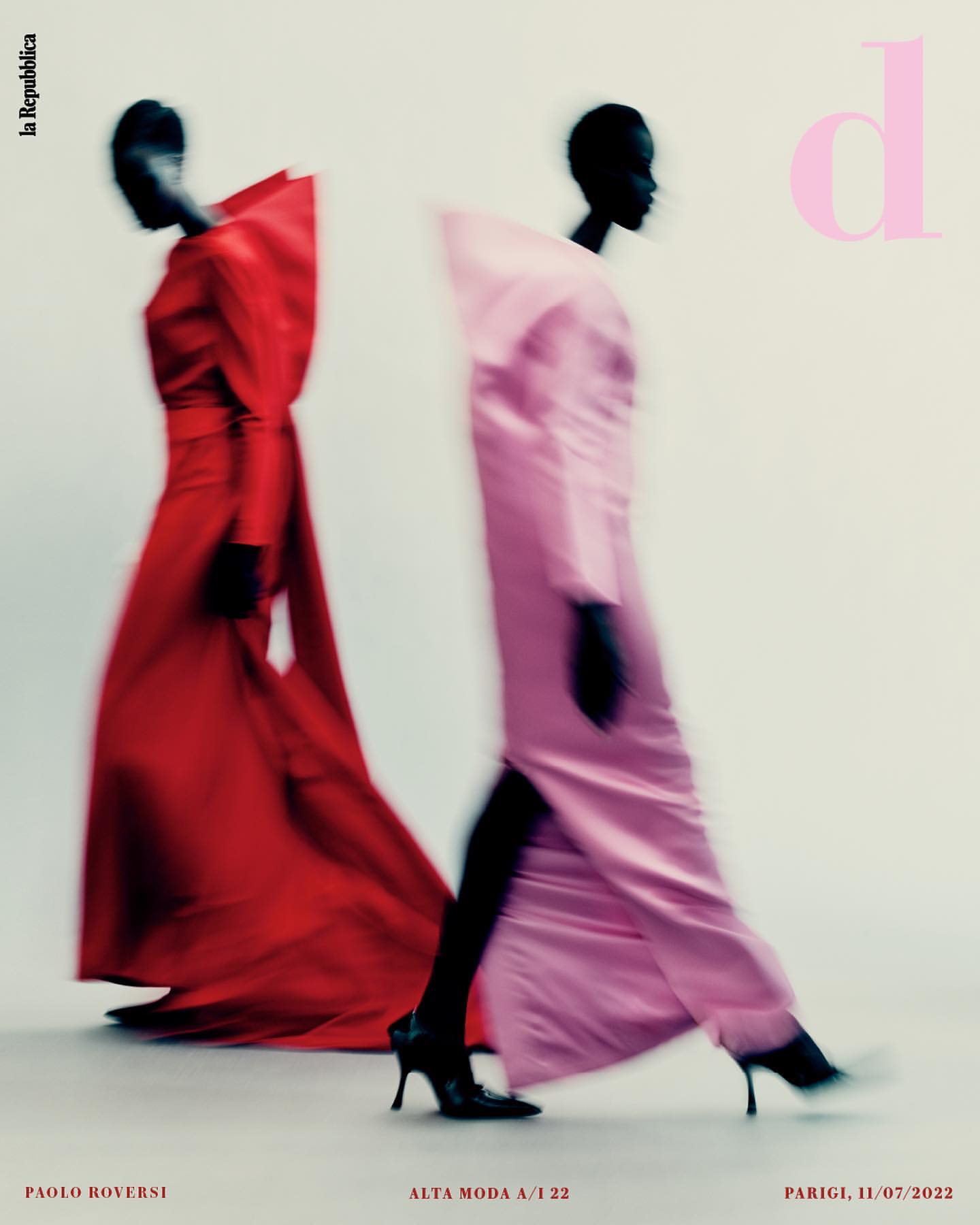 Two fashion models in gowns walking, blurred motion effect, monochromatic colors, light background, studio lighting. Editorial fashion photography.