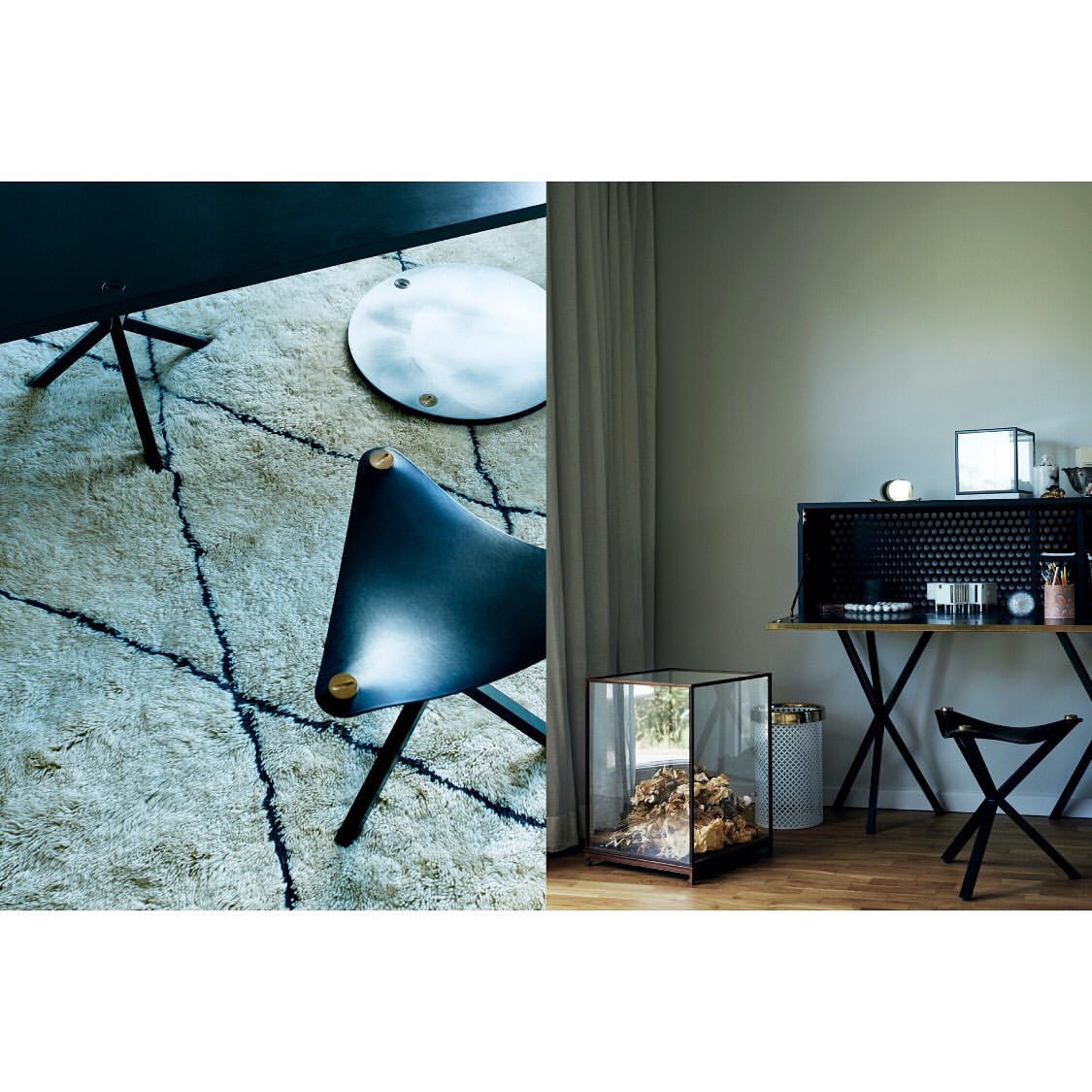 Interior design featuring a black desk with accessories, a modern black chair, and a glass display case in a naturally lit room.