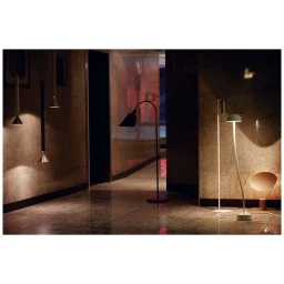 Interior shot showcasing various modern designer lighting fixtures arranged in a hotel hallway by Pär Olofsson