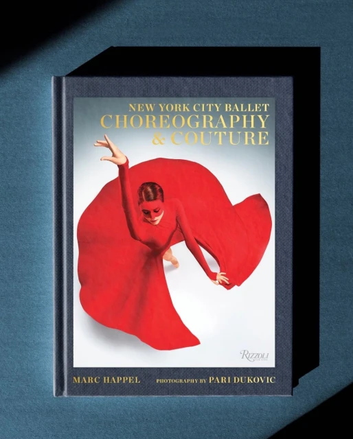 New York City Ballet: Choreography & Couture book cover featuring a dancer in a red garment on a white backdrop under studio lighting.