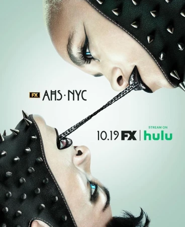 Promotional image for American Horror Story: NYC featuring close-up of two people with pale skin, dark eye makeup, and spiked leather headgear.