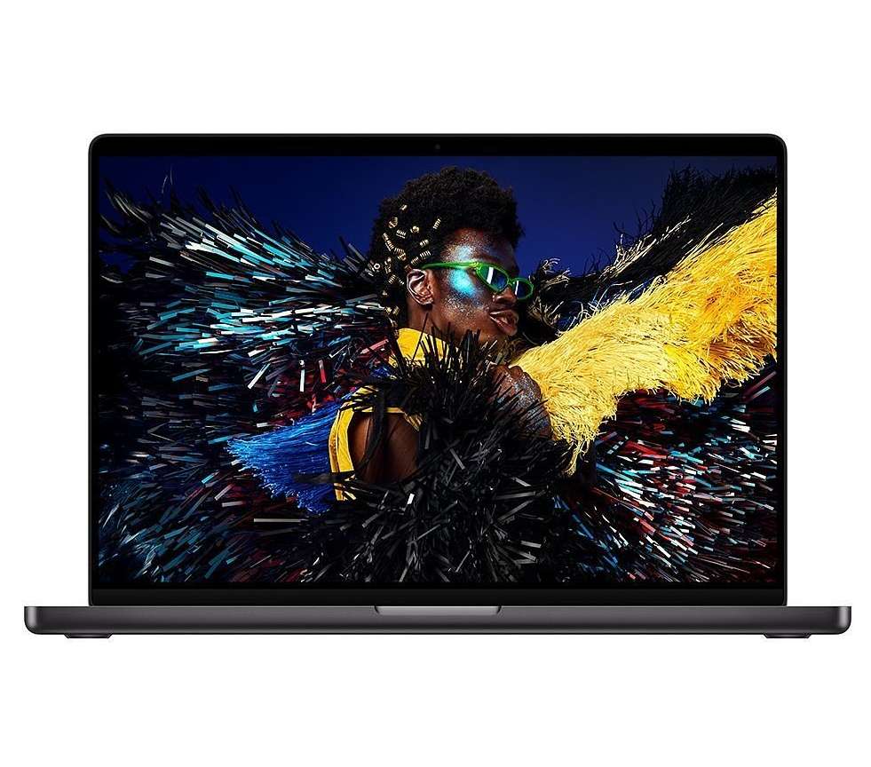 Laptop displaying a person with elaborate makeup and costume, set against a deep blue backdrop, with dynamic abstract elements.