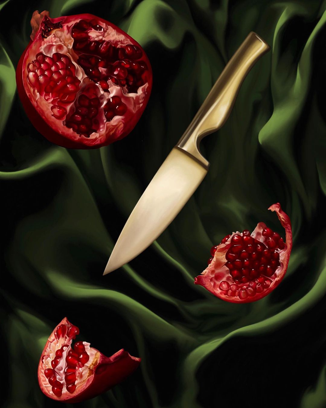 Still life painting of a halved pomegranate, pomegranate segments, and a knife on draped green fabric, creating a rich, vibrant food image.
