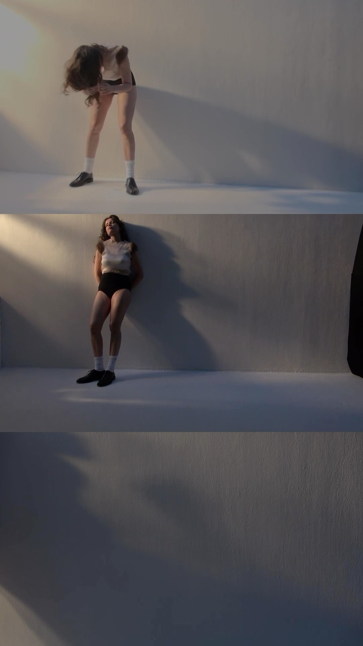 A woman in a white top and dark shorts posing against a white studio wall across three stacked vertical panels by Paul Franco.