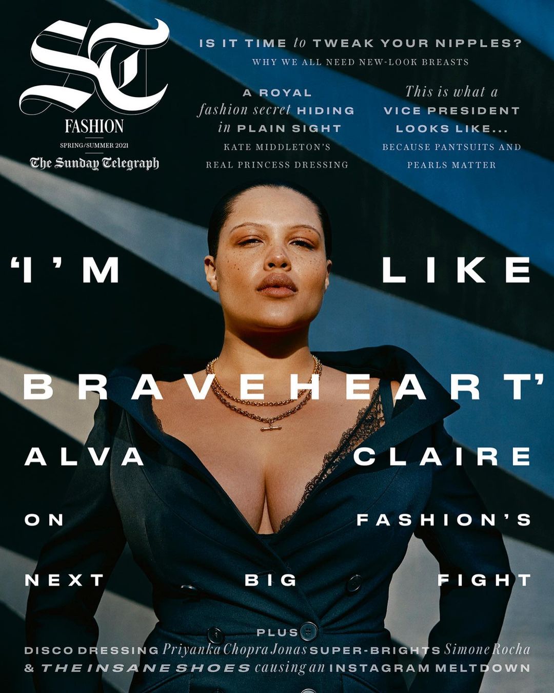 Alva Claire wearing a dark coat and gold necklace against a geometric blue and white architectural background by Paul Mclean