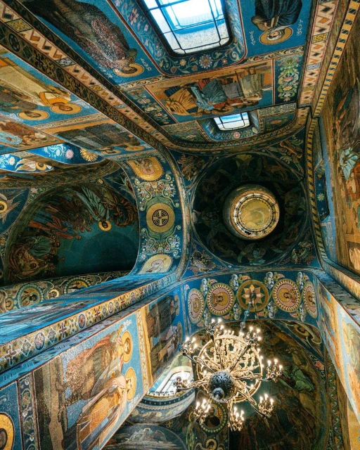 Intricate architecture and religious artwork adorn the interior of the Church of the Savior on Spilled Blood in Saint Petersburg, Russia.