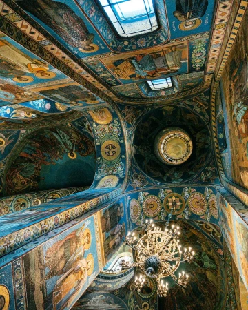 Intricate architecture and religious artwork adorn the interior of the Church of the Savior on Spilled Blood in Saint Petersburg, Russia.