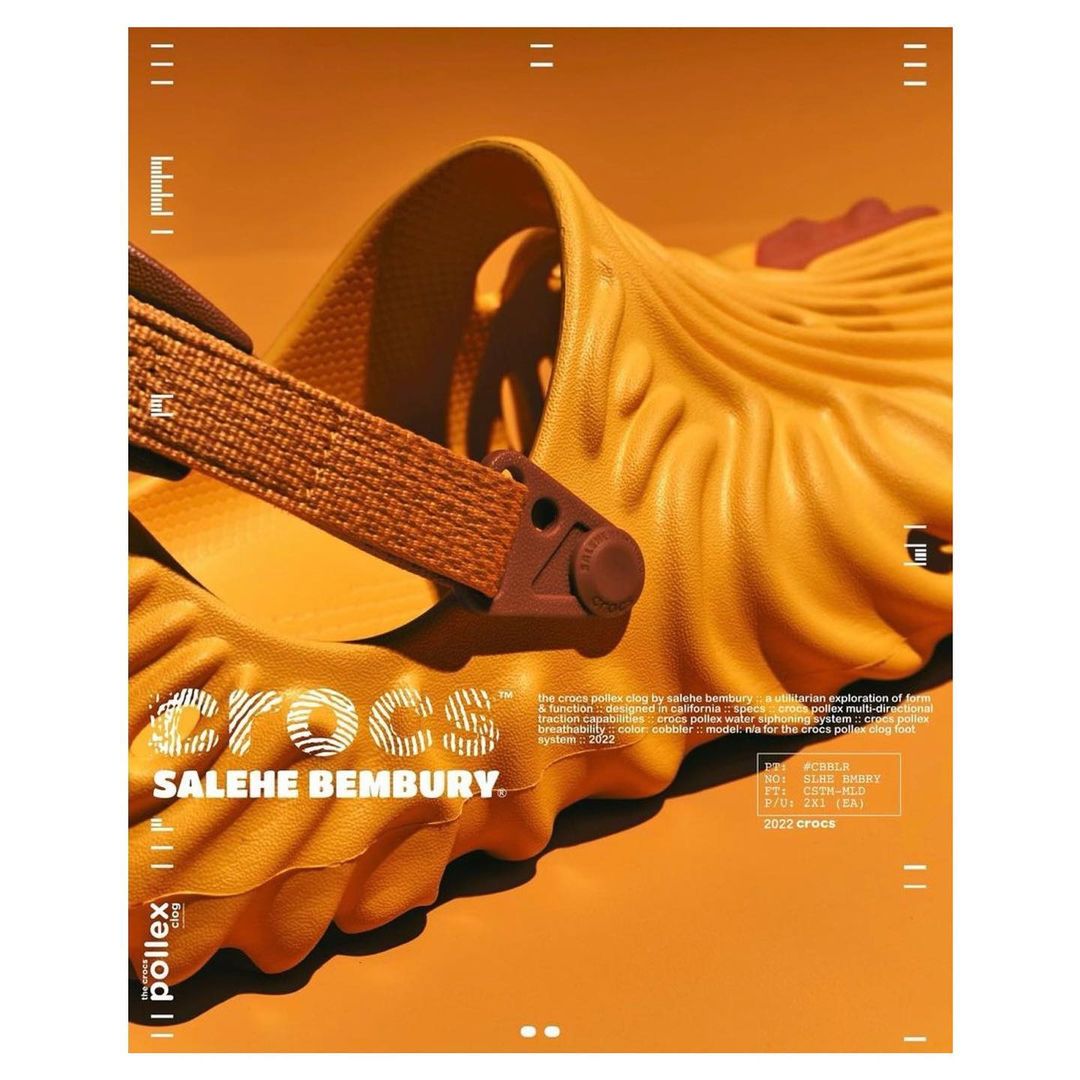 Promotional poster showcasing the Crocs Pollex Clog by Salehe Bembury, highlighting its unique design and textured details on a orange background.