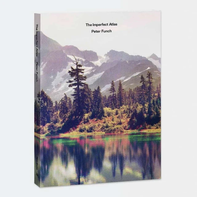 Landscape book cover featuring mountains, forest, and lake reflections in muted, natural tones.