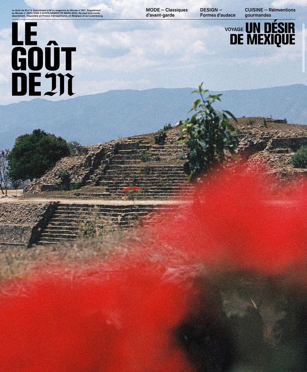 Magazine cover with a stepped stone pyramid against a mountain backdrop, overlaid with red foreground elements and article text.