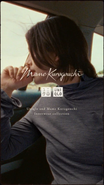 Adult woman in a grey long-sleeve shirt, visible inside a car with a blurred outdoor view, logo and script in the foreground.