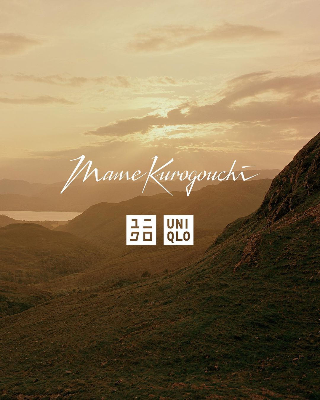 Landscape view featuring mountains, lake, and a warm sky at sunset with the 'Mame Kurogouchi' and Uniqlo brand logos in white.