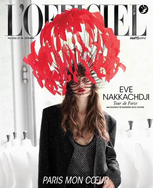 L'Officiel Italia magazine cover featuring a stylish adult female model in a black blazer and a red feathered headpiece.