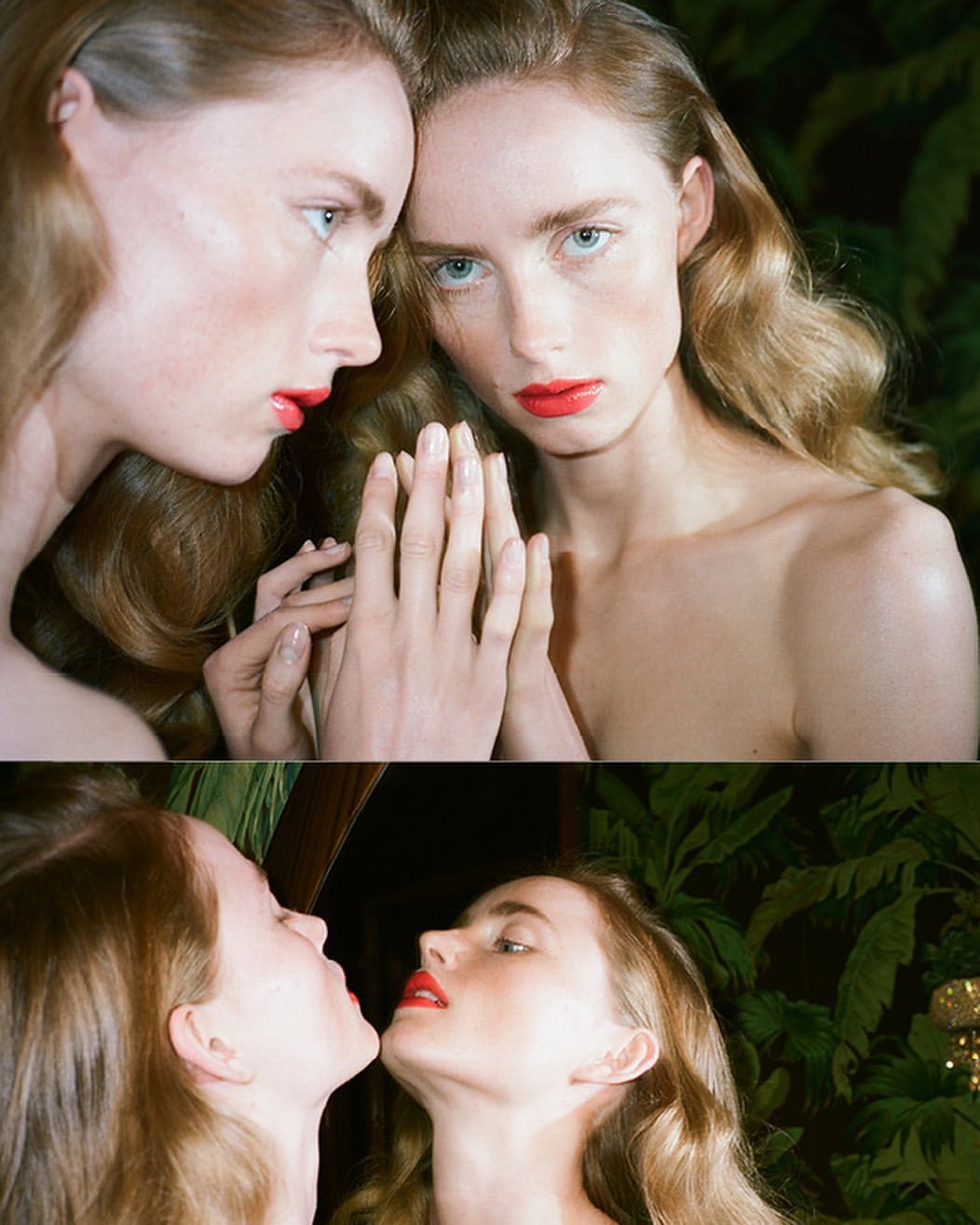 Two women, one looking at the camera, the other in profile with a mirror effect, show off bright red lipstick in a studio portrait.