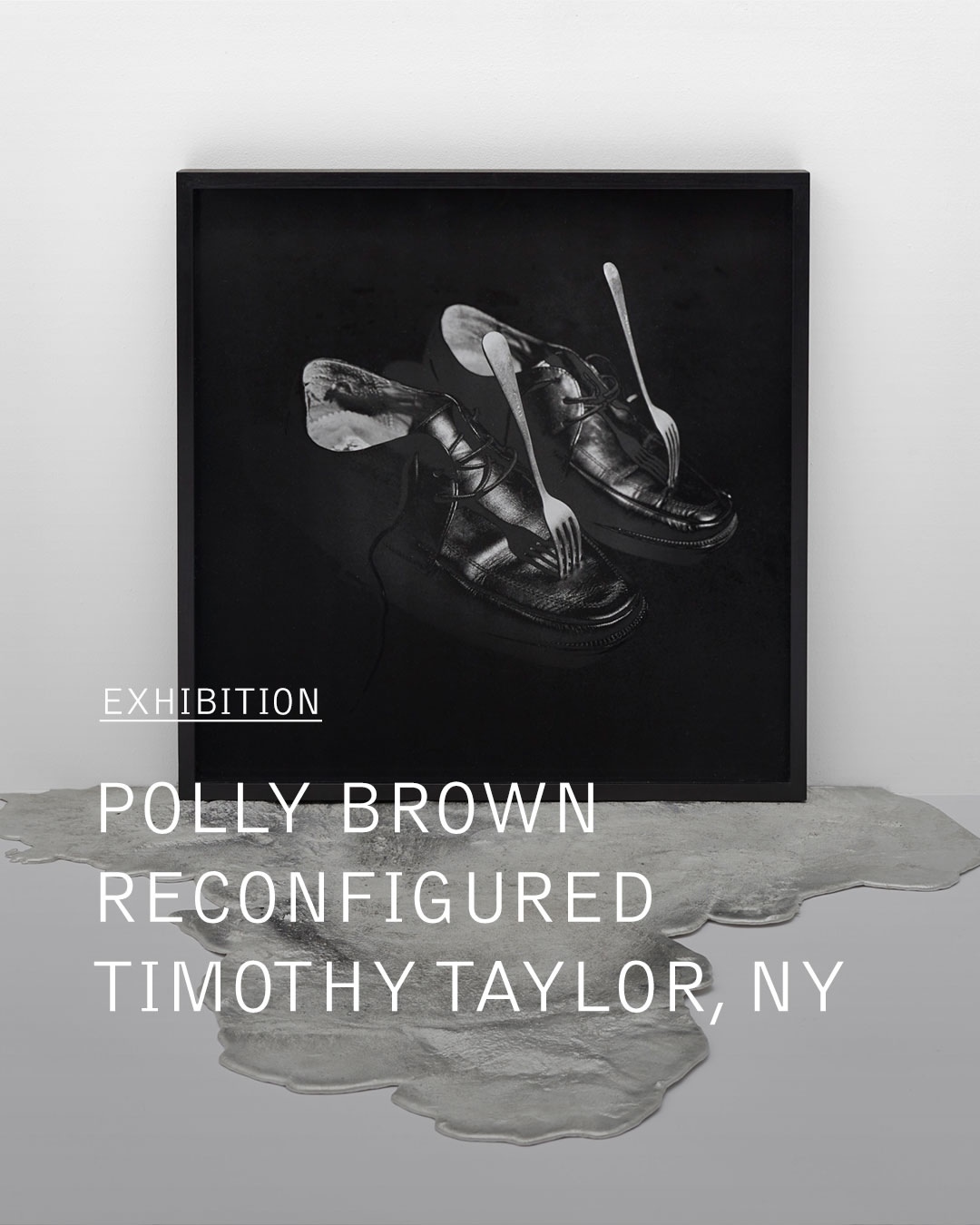 Monochromatic art photography of black leather shoes with forks, set against a black backdrop, displayed in a black frame in a gallery.