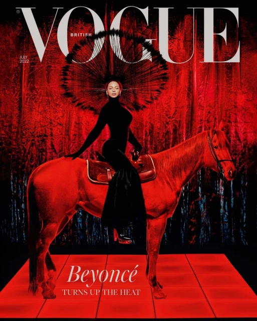 Vogue cover featuring a woman in a black bodysuit, sitting side-saddle on a red horse against a vibrant red patterned background.